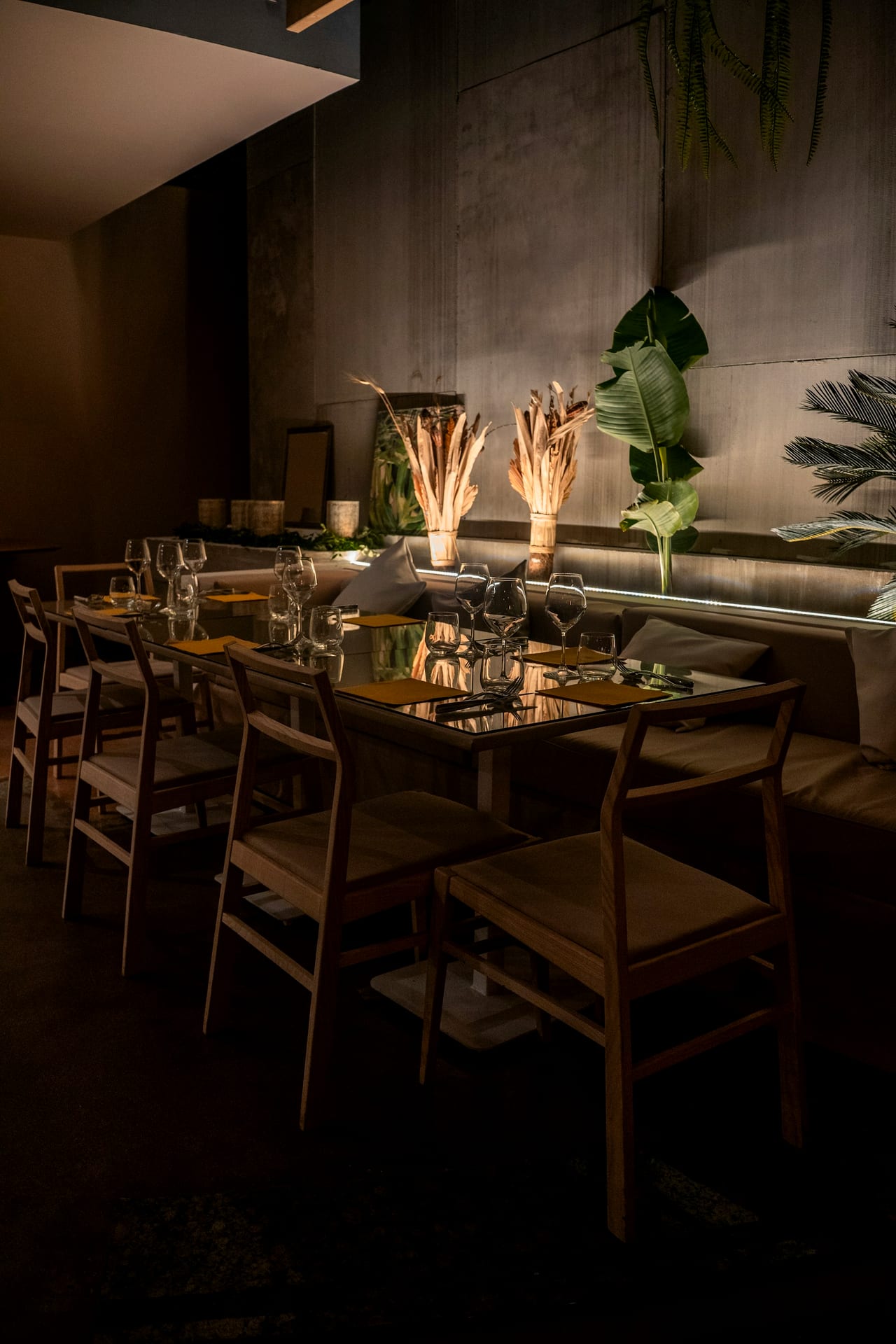 Tables laid in warm light, ready for service